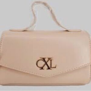 CXL Laine Matte Patent Crossbag Color: Panna Cotta